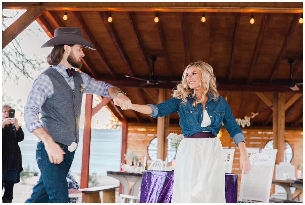 Texas styled bride and groom's first dance for outdoor Texas styled wedding photographed by Dallas wedding photographer Jenny Bui of Picture Bouquet Studio. 