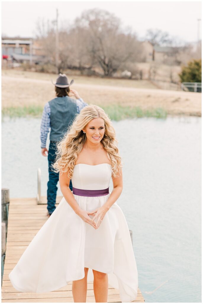 Bride waiting to approach groom for first look for outdoor Texas styled wedding photographed by Dallas wedding photographer Jenny Bui of Picture Bouquet Studio. 