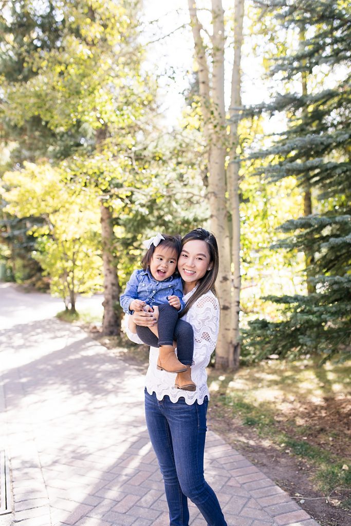Mother and daughter on pathway in Vail Village. 