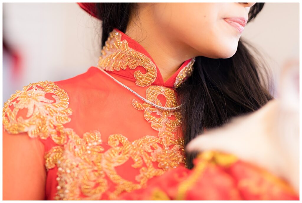 Close up of beading on bridal ao dai for Dallas traditional Vietnamese tea ceremony photographed by Jenny Bui of Picture Bouquet Studio. 