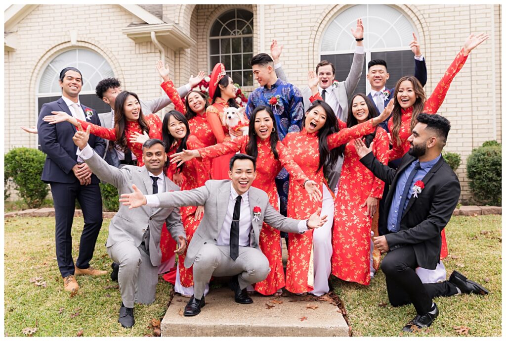 Fun bridal party in red and gold ao dais for Dallas Vietnamese tea ceremony photographed by Jenny Bui of Picture Bouquet Studio. 