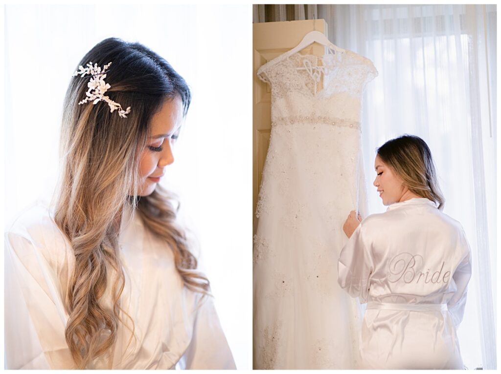 Bride in white robe getting ready in hotel room and admiring wedding dress photographed by Picture Bouquet Studio. 