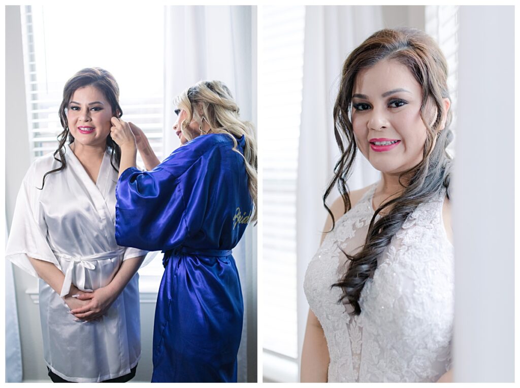 Bridesmaid in royal blue robe helping bride put on her earrings on wedding day for Dallas Vietnamese wedding photographed by Jenny Bui of Picture Bouquet Studio. 