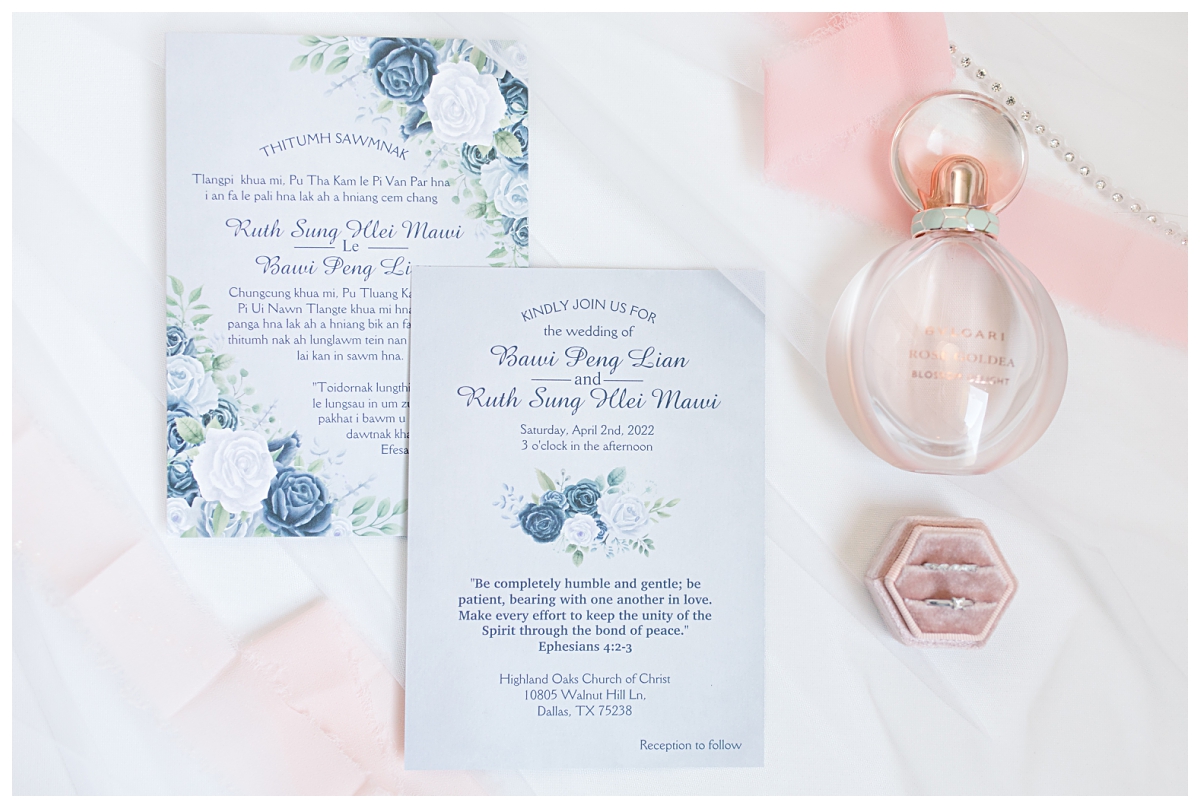 Flat lay of wedding invitation and bridal details during getting ready portion of a Dallas Asian wedding photographed by Jenny Bui of Picture Bouquet Studio. 