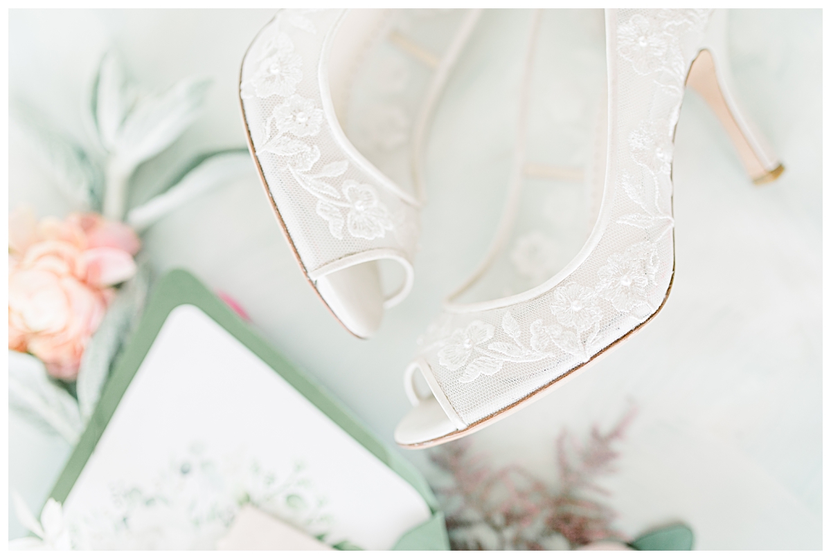 Close up of beautiful lace wedding day shoes at The Olana Wedding venue for styled shoot photographed by Dallas Wedding Photographer Jenny Bui of Picture Bouquet Studio. 