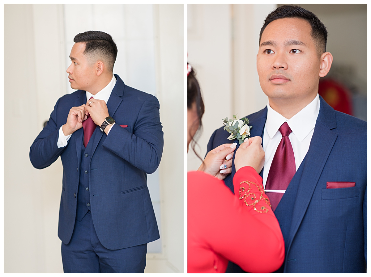 Groom in navy suit with burgundy tie getting ready at Zander House for wedding reception photographed by Dallas wedding photographer Jenny Bui of Picture Bouquet Studio. 