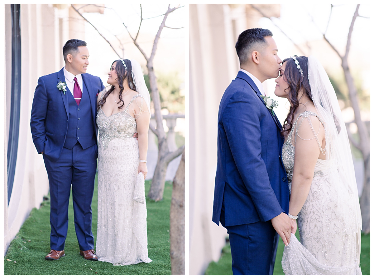 Bride in vintage wedding dress and groom in navy suit and burgundy tie pose during portrait session at Zander House photographed by Dallas wedding photographer Jenny Bui of Picture Bouquet Studio. 