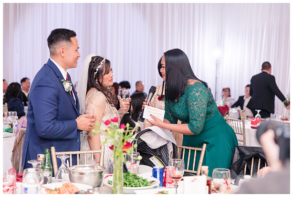 Bride and groom greets each table at Zander House wedding photographed by Dallas wedding photographer Jenny Bui of Picture Bouquet Studio. 