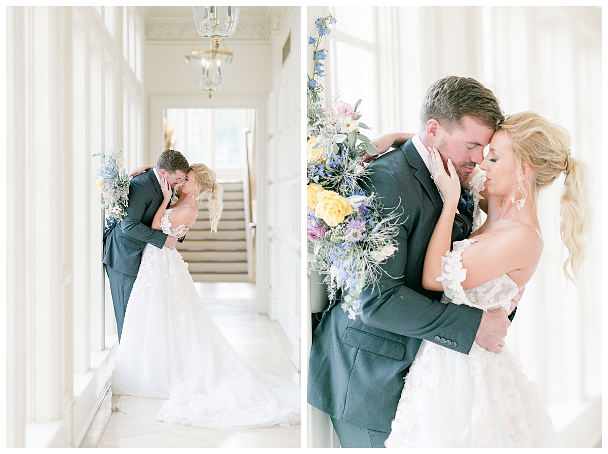Bride in off shoulder white wedding gown and groom leaning against windows in the hallways of one of the best dallas wedding venue, The Olana, photographed by Jenny Bui of Picture Bouquet Studio. 