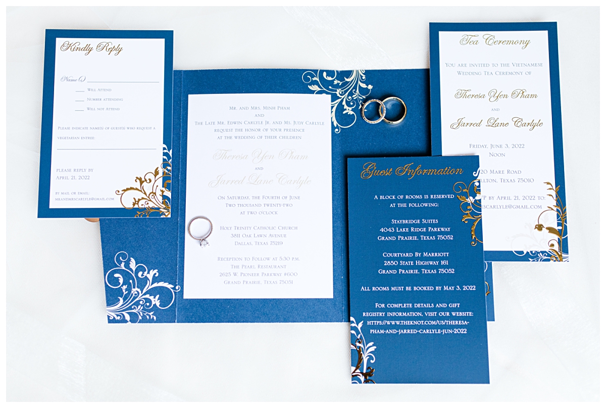 Royal blue wedding day flatlay photographed by Dallas wedding photographer Jenny Bui of Picture Bouquet Studio for Holy Trinity Catholic Church wedding in Dallas, TX.  