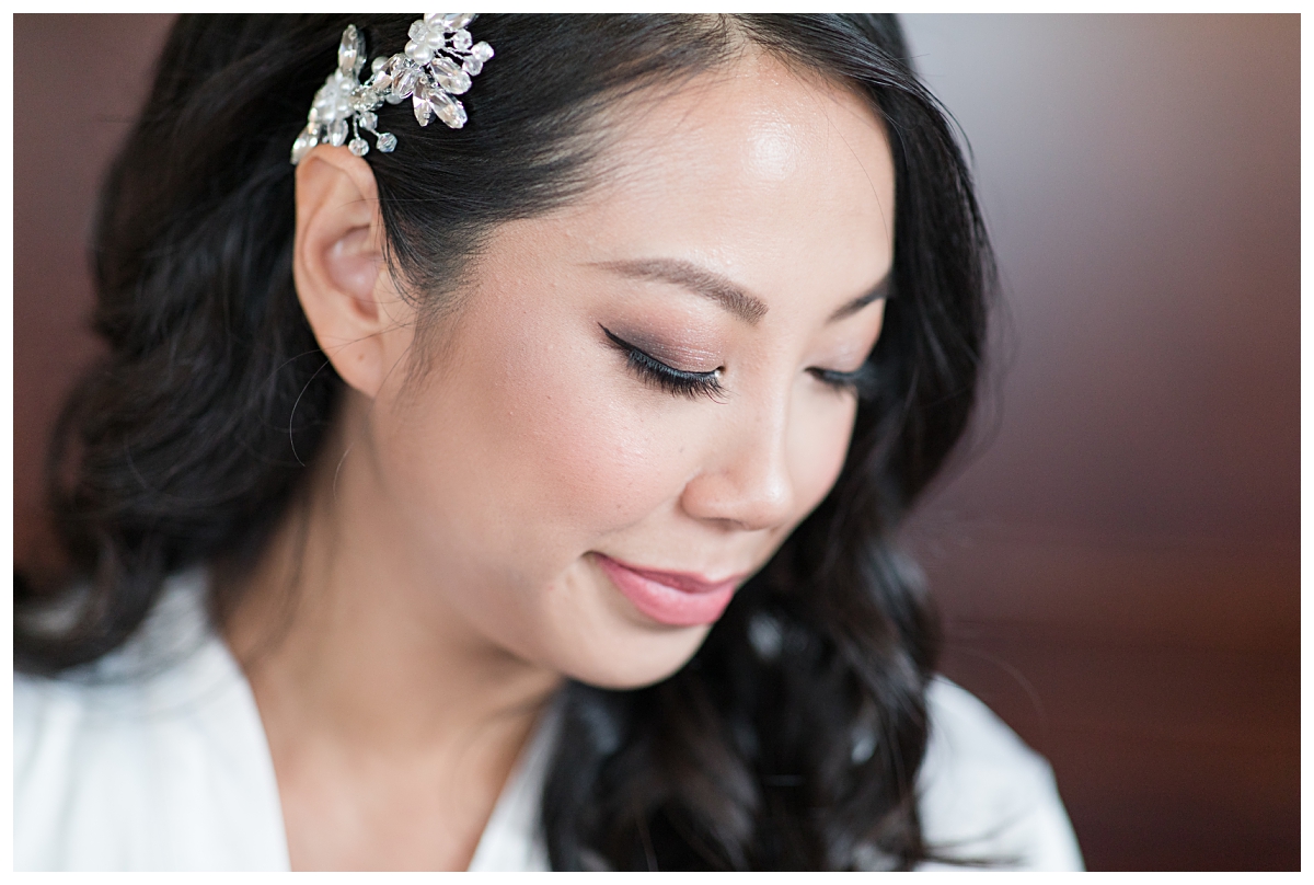 Close up of bridal makeup for Asian bride photographed by Dallas wedding photographer Jenny Bui of Picture Bouquet Studio for Holy Trinity Catholic Church wedding in Dallas, TX.  