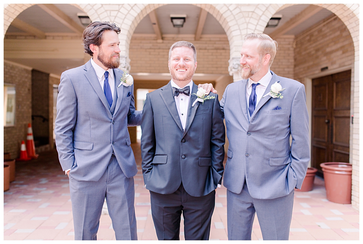 Shot of groomsmen and groom photographed by Dallas wedding photographer Jenny Bui of Picture Bouquet Studio for Holy Trinity Catholic Church wedding in Dallas, TX.  