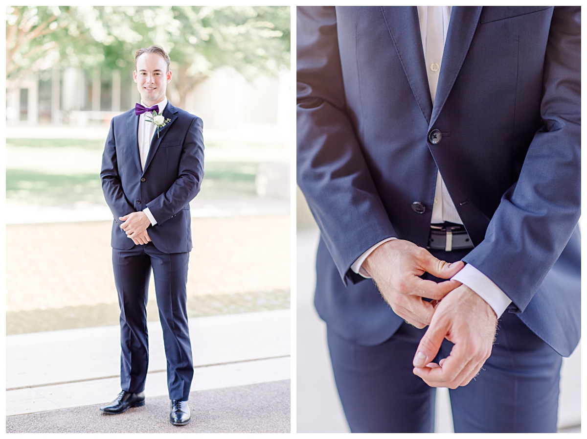 Groom in navy suit and purple bowtie poses for Kimbell Art Museum wedding portraits photographed by Dallas wedding photographer Jenny Bui of Picture Bouquet Studio. 
